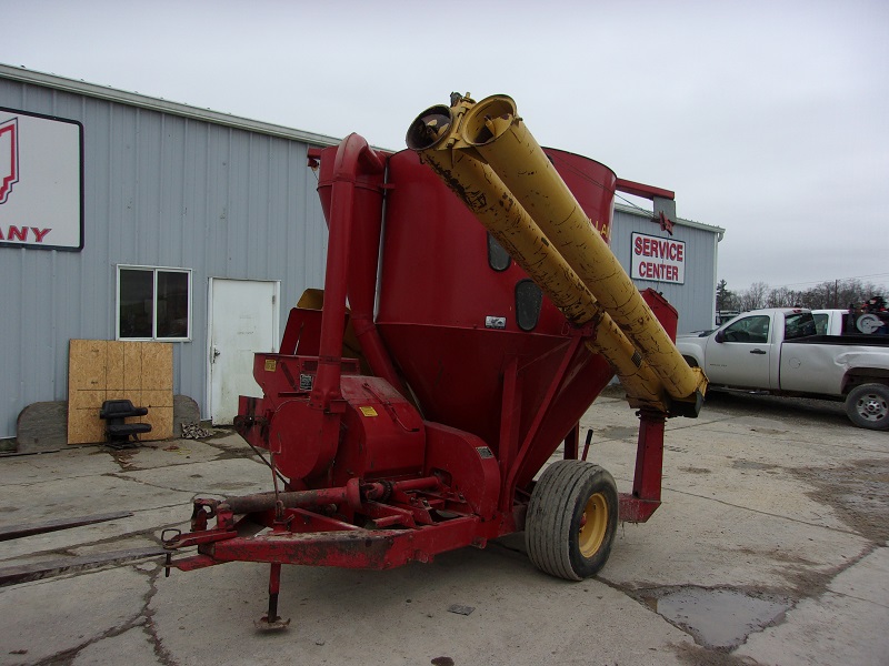 this used new holland 355 grinder mixer is in stock at baker and sons equipment in ohio