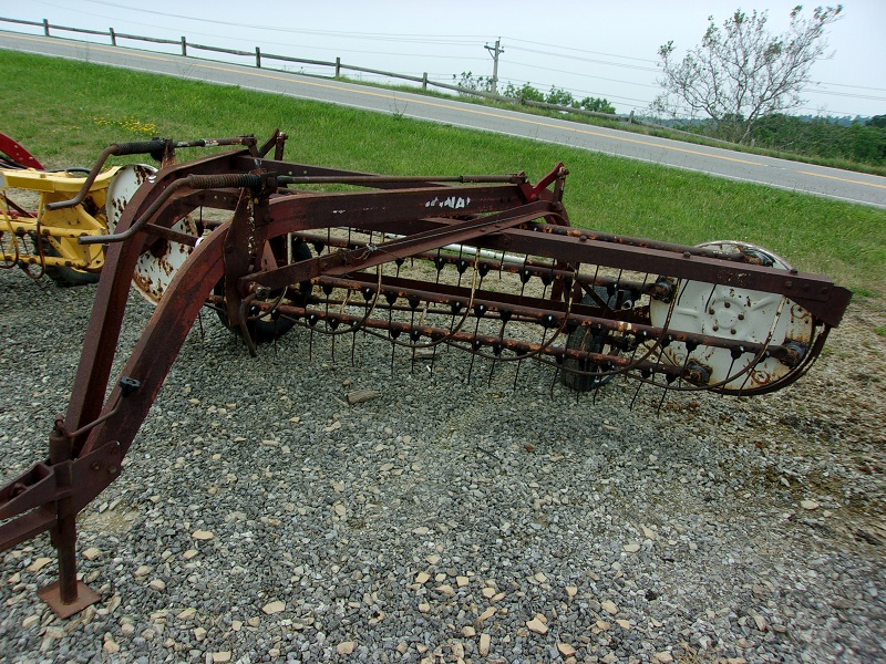used IH rake in stock at Baker and Sons Equipment in Lewisville, Ohio