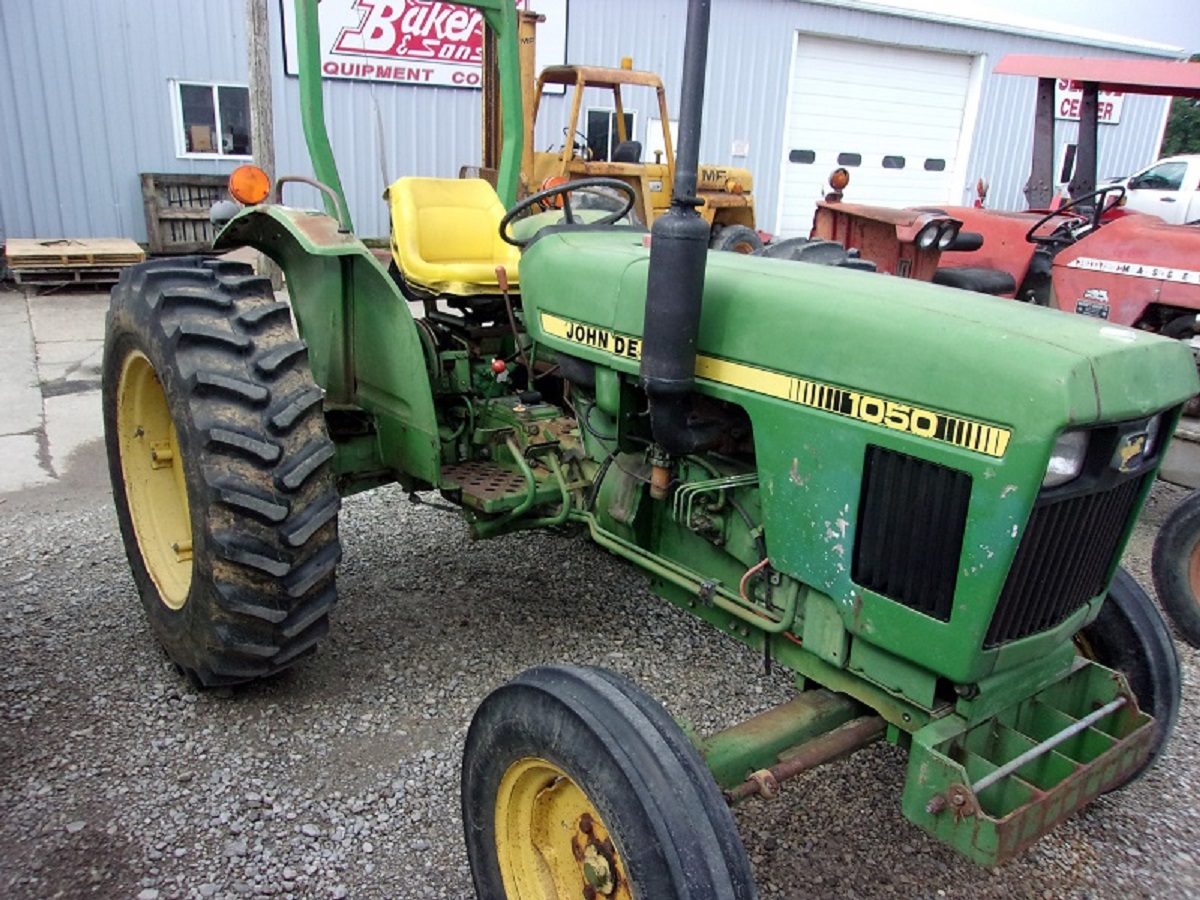 1986 John Deere 1050 tractor for sale at Baker & Sons Equipment in Lewisville, Ohio.