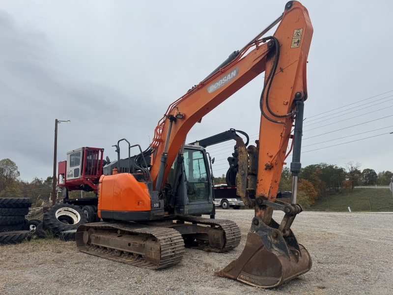 Used Doosan DX140LCR-5 excavator for sale at Baker and Sons Equipment in Ohio