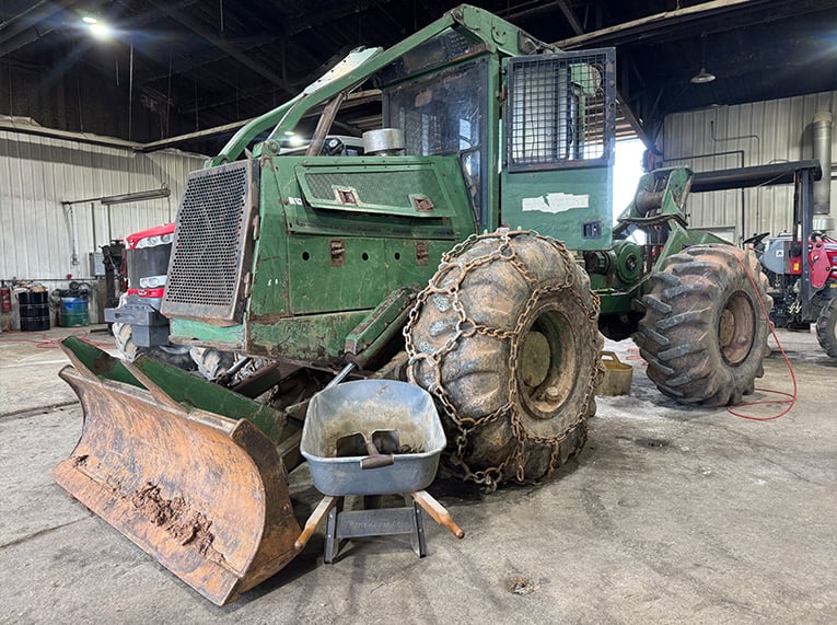 green tractor in service